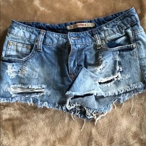 Destroyed denim shorts